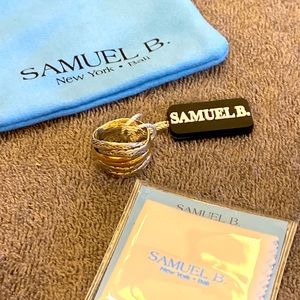 Sterling silver and 18K gold. Size 6